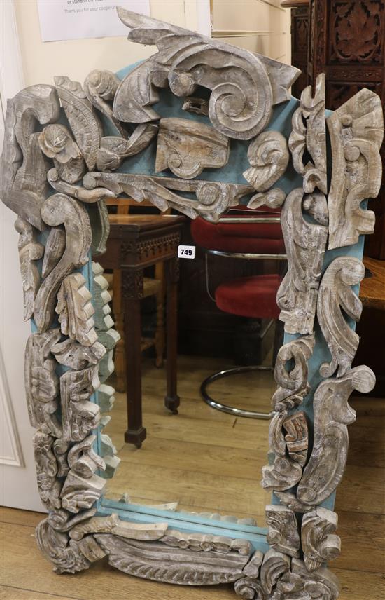 A carved silvered wood framed mirror, H.121cm